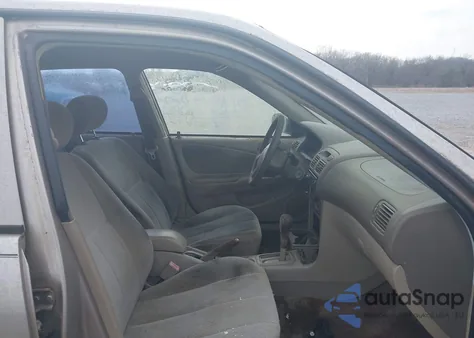 1999 Toyota Corolla Ce z USA, uszkodzony, nr VIN 2T1BR12E3XC221038